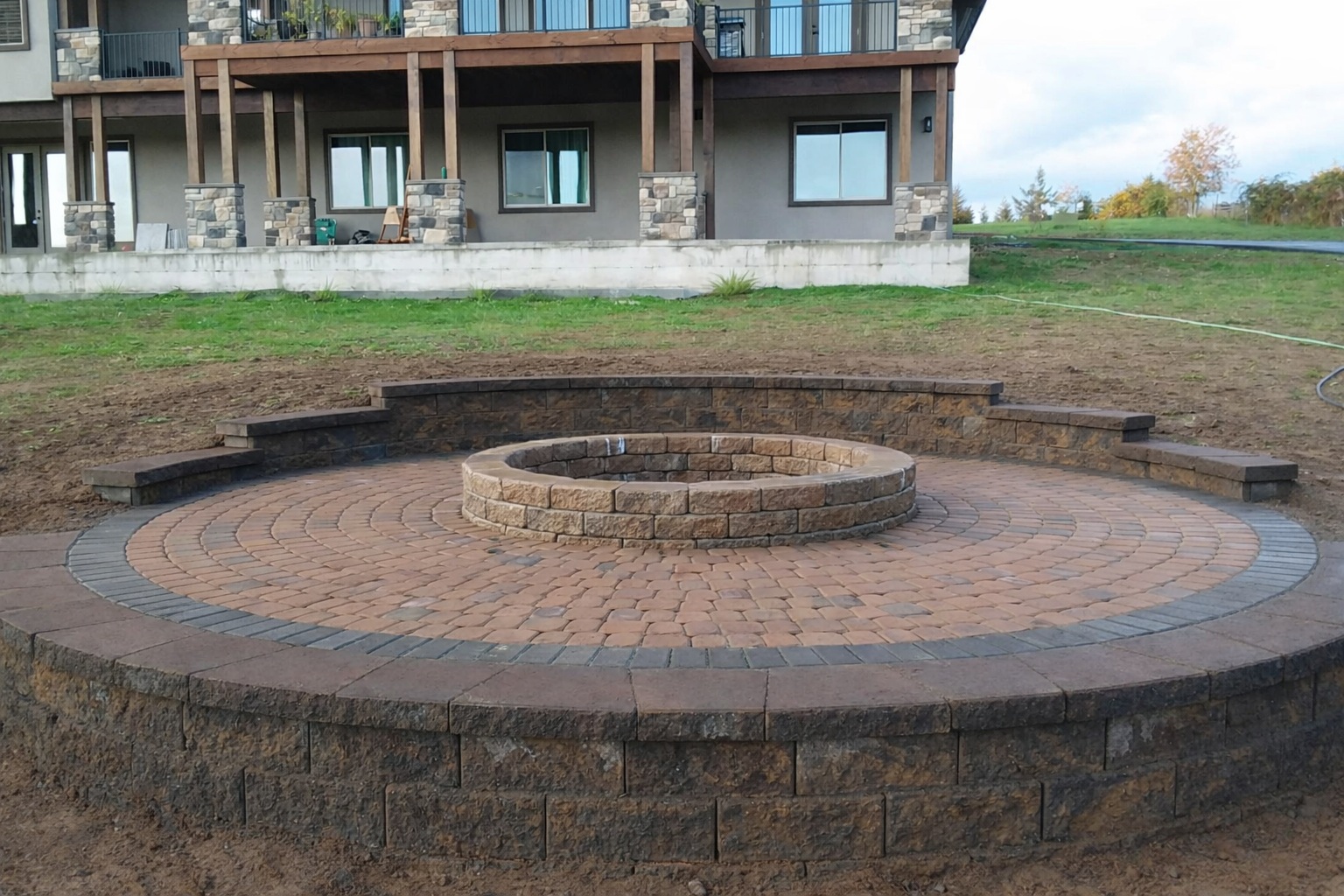 Circular paver fire pit patio in Washougal, WA